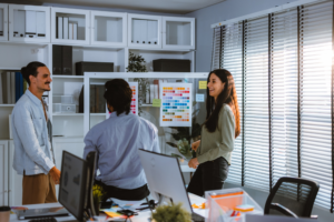 Startup team collaborates on color selection for user centric product design, optimizing experience